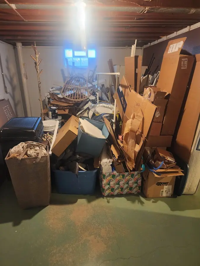 Roll-off dumpster container at job site for 6 Yard Dumpster Rental in Lowell